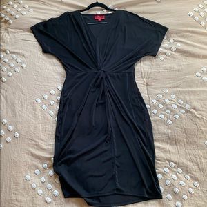 Jennifer Lopez cinched waist cold shoulder dress